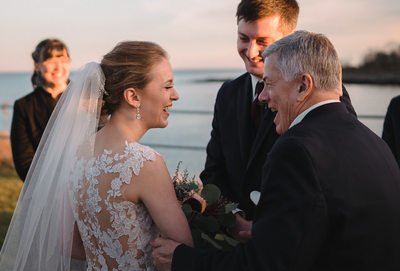 Father giving his daughter away at the wedding ceremony